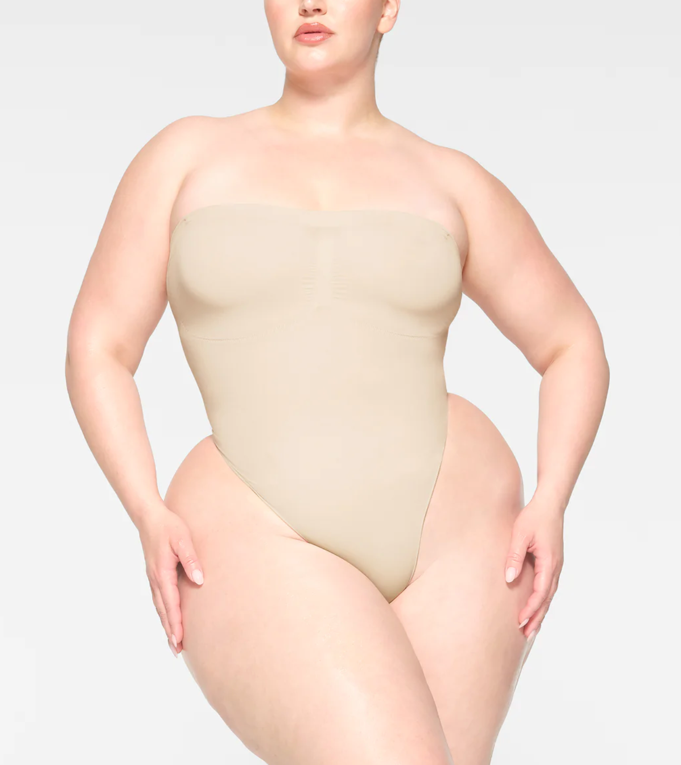 SKIMS Strapless Thong Bodysuit  Seamless Sculpt by Skims Kim Kardashian